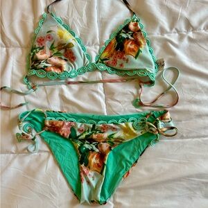 Becca High Tea side tie bikini set. Both size M.